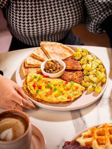 Desi breakfast — omelette, paratha and chai